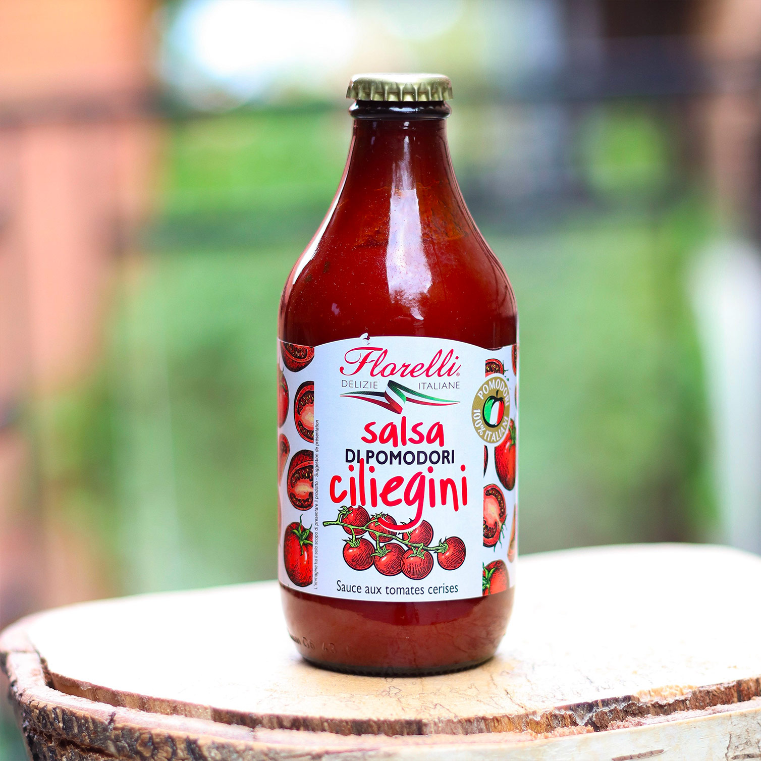 Une petite bouteille de 330g de sauce aux tomates cerises Florelli